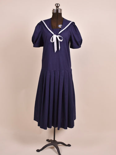 Navy Sailor Dress By Laura Ashley as shown from the front