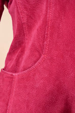 Load image into Gallery viewer, Pink suede jacket pocket is shown up close. The jacket has curved pocket seams.
