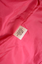 Load image into Gallery viewer, Pink suede jacket label is shown up close. The label says &quot;100% leather.&quot;

