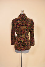 Load image into Gallery viewer, Brown 1970s Velvet Three Piece Set by Miss Dior, S/M. Jacket pictured from side.