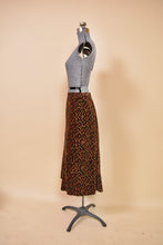 Load image into Gallery viewer, Brown 1970s Velvet Three Piece Set by Miss Dior, S/M. Skirt pictured from side.