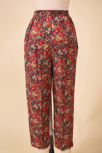 Load image into Gallery viewer, Laura Ashley pants are shown from the front. The pants are floral print.
