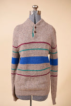 Load image into Gallery viewer, Sweater is shown from the front. The sweater has colorful stripes.

