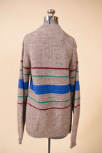 Load image into Gallery viewer, Beige sweater is shown from the back. The sweater has long sleeves.
