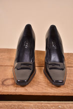 Load image into Gallery viewer, Gucci vintage heels are shown from the front. The heels are black.