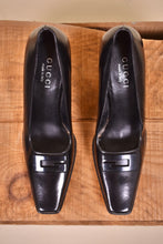 Load image into Gallery viewer, Vintage designer heels are shown from the front. The heels are made by Gucci.
