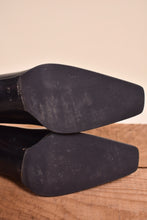 Load image into Gallery viewer, Italian Gucci heels are shown from the bottom. The shoes have tall heels.