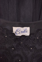 Load image into Gallery viewer, 1950s black party dress close up of brand label reading Cirilo
