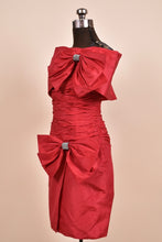 Load image into Gallery viewer, Red 80s ruched off shoulder cocktail dress with bows shown from the side

