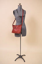 Load image into Gallery viewer, 1970s Red Coach Binocular Bag shown on mannequin 
