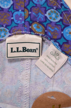 Load image into Gallery viewer, Closeup of blue jumper dress tags. The tags read LL Bean, LG Girls, 100% cotton, made in China.
