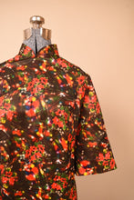 Load image into Gallery viewer, Psychedelic christmas floral maxi dress bodice shown close up
