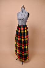 Load image into Gallery viewer, The skirt pleats are maintained throughout the piece.
