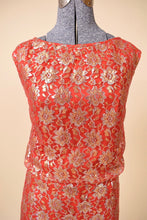 Load image into Gallery viewer, Vintage 60's red and gold metallic lace party dress is shown in close up. This dress is sleeveless.