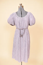 Load image into Gallery viewer, Vintage 1980's lilac purple Pierre Labiche micropleat puff sleeve dress is shown from the front. This dress has a rope belt that ties around the waist.