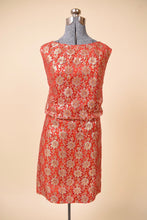 Load image into Gallery viewer, Vintage 1960's red metallic lace party dress by Algo is shown from the front. This dress has a gold lace overlay.
