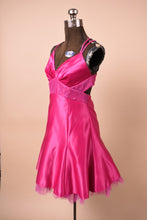 Load image into Gallery viewer, Vintage Jessica McClintock dress is shown from the side. The dress is short.
