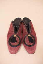 Load image into Gallery viewer, Vintage red suede Italian mules are shown from above. These shoes have black tassels.

