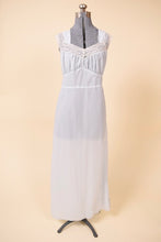 Load image into Gallery viewer, Vintage 1960s pale blue semi sheer slip dress by Radcliffe is shown from the front. This dress has white lace trim. 
