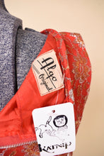 Load image into Gallery viewer, Vintage 60's red metallic lace party mini dress is shown in close up. This dress has a tag that reads Algo Original.