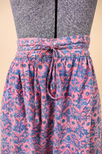 Load image into Gallery viewer, Vintage floral block print pink and blue maxi skirt is shown in close up. 
