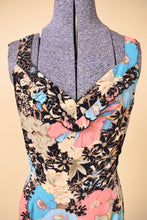 Load image into Gallery viewer, Vintage flirty 90's ruffle rayon midi length dress is shown in close up. This dress has a v neckline with ruffle trim.