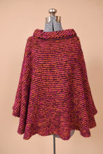 Load image into Gallery viewer, Vintage pink woven boucle cape is shown from the front. This Irish wool cape has a turtleneck.