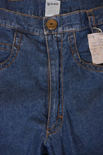 Load image into Gallery viewer, Vintage navy blue thin worn denim jeans by Emmegi are shown in close up. These tapered boyfriend jeans have a zipper fly. 
