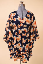 Load image into Gallery viewer, Vintage Y2K navy blue and orange floral flowy mini dress is shown from the front. This dress has flowy bell sleeves.