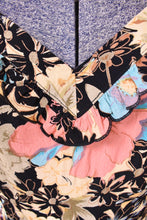 Load image into Gallery viewer, Vintage nineties Loco Lindo floral ruffled rayon dress is shown in close up. This dress has a geometric v neckline.