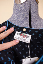 Load image into Gallery viewer, Vintage 70s Lanz of Salzburg cotton prairie dress is shown in close up. This dress has a tag that reads Lanz Originals.