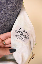 Load image into Gallery viewer, Vintage sixties floral print day dress is shown in close up. This dress has a tag that reads Jay Herbert California.