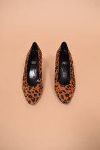 Load image into Gallery viewer, Vintage eighties Spanish-made suede animal print heels are shown from the front.
