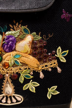 Load image into Gallery viewer, Vintage sixties Enid Collins wooden fruit platter bag is shown in close up. This bag has banana, pear, and grape appliques. 
