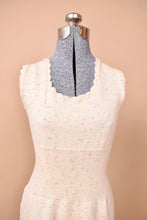 Load image into Gallery viewer, The front of the dress has a lowered neck.