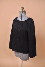 Load image into Gallery viewer, The top is angled on the mannequin.