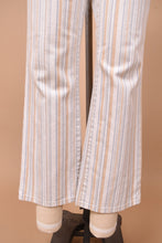 Load image into Gallery viewer, Vintage Y2K flare stripe trousers by Theory are shown in close up. These pants have a bell bottom fit.
