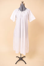 Load image into Gallery viewer, Antique white crochet neckline nightgown is shown from the front. This maxi length nightgown has a ribbon at the neckline.
