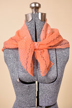 Load image into Gallery viewer, Vintage sheer orange square handkerchief scarf is shown styled around a neck. This floral print scarf has a leaf print. 
