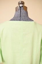 Load image into Gallery viewer, Vintage electric green linen and cotton blend midi dress is shown in close up. 
