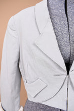 Load image into Gallery viewer, Vintage baby blue y2k Zac Posen cropped blazer is shown in close up. This blazer has a structured lapel.
