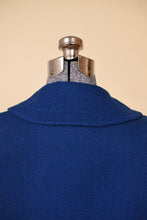 Load image into Gallery viewer, 1950&#39;s cobalt blue vintage wool blazer is shown in close up. This cropped blazer has a rounded collar. 
