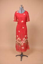 Load image into Gallery viewer, Vintage 1990&#39;s red lined sheer floral dress is shown from the front. This dress has short sheer sleeves.
