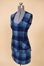 Load image into Gallery viewer, Vintage 70&#39;s blue and navy plaid skirt set is shown from the side. This set has two pockets at the waist.
