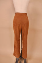 Load image into Gallery viewer, Vintage Y2K brown faux suede cowgirl western pants are shown from the back. These western inspired pants have a western inspired cut.
