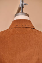 Load image into Gallery viewer, Vintage 1990s brown faux suede Western style pants set is shown in close up. This soft brown blazer has a bold collar. 
