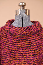 Load image into Gallery viewer, Vintage Irish wool knit sleeveless cape is shown in close up. This cape has a textural boucle knit.