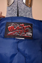 Load image into Gallery viewer, Vintage navy blue Made in the USA quilted puffer coat is shown in close up. This jacket has a tag that reads White Bear of St. Paul.
