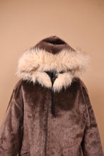 Load image into Gallery viewer, Vintage sixties brown furry jacket is shown in close up. This jacket has a hood that is lined with a white faux fur. 
