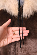 Load image into Gallery viewer, Vintage 1960&#39;s brown faux fur jacket is shown in close up. 
